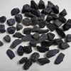 bulk quantity supply tumble basalt stone / cheap price Indian wholesaler black basalt tumbled stone / granite and basalt stone