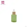 12ml refreshing green color with rounded shape for wholesale skincare liquid dropper bottle