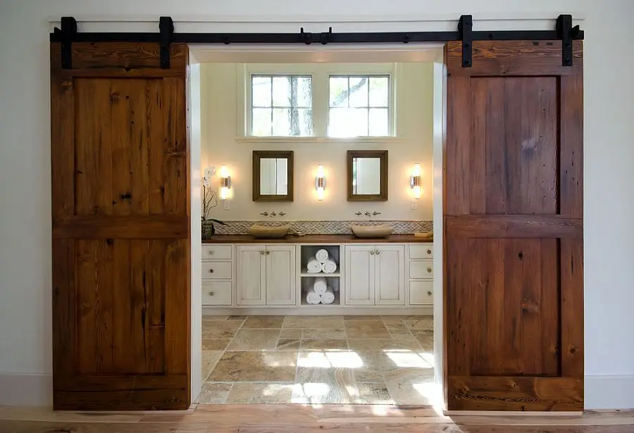 Gorgeous-reclaimed-Fir-barn-doors-for-the-posh-master-bathroom.jpg