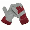 Cow split leather.Full palm.Red cotton drill back.Rubberized cuff.Half lining