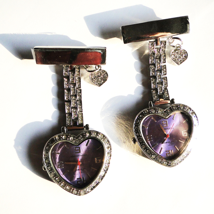 
metal heartshaped nurse watch with shining crystal stones 