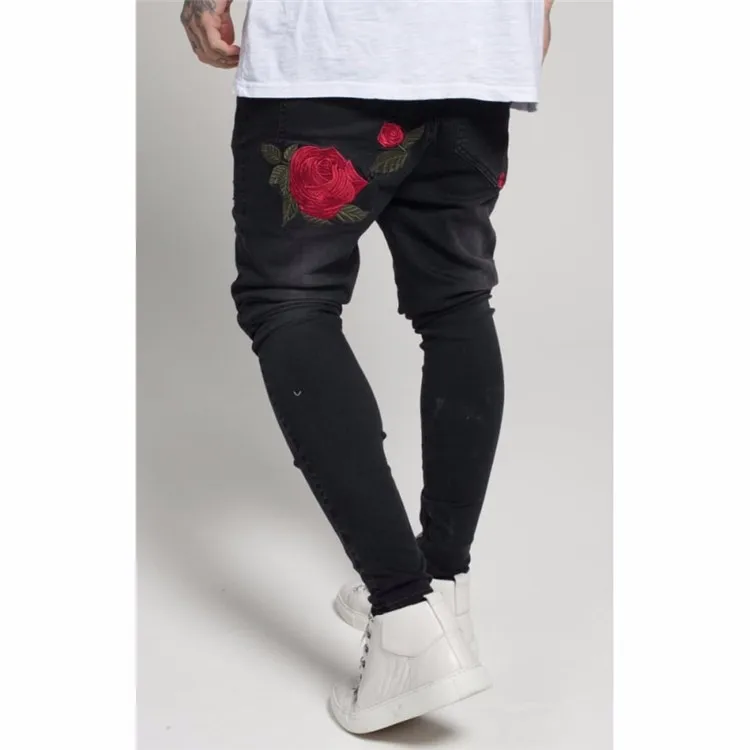 rose embroidered jeans mens