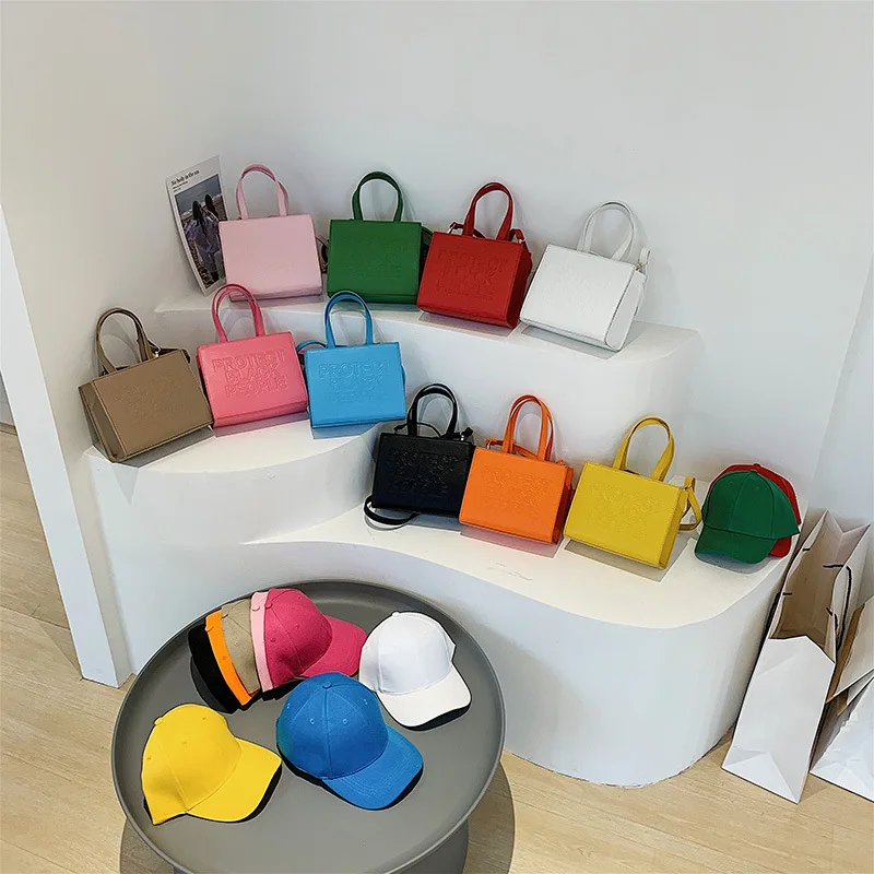 

2022 New Arrival Designer Handbags Famous Brands Black People Bag Luxury Leather Women Purse and Hat Sets