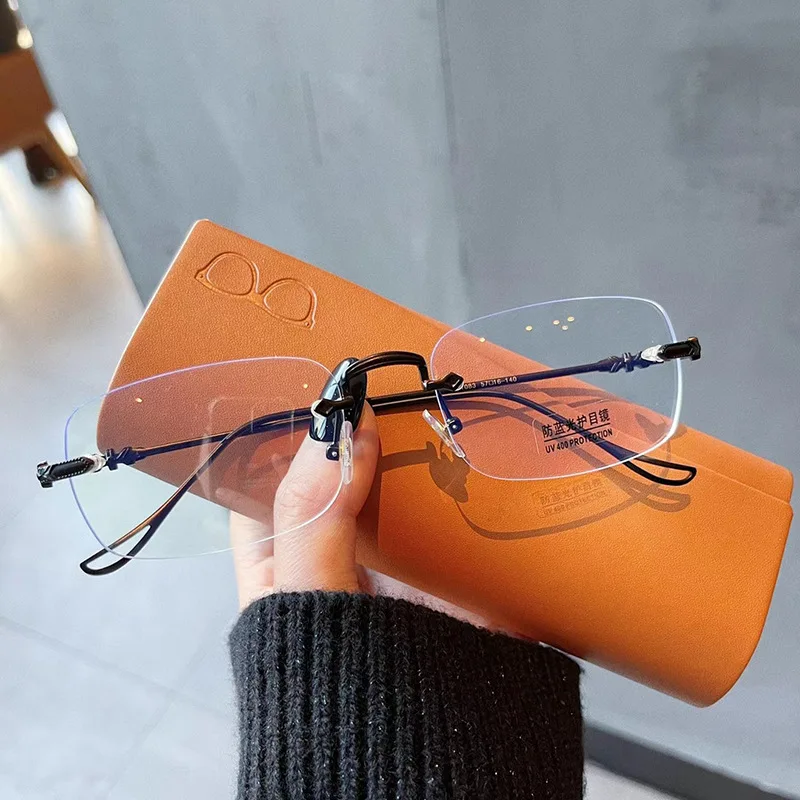 

Top Glass Frame Manufacturer Newest Small Square Crystal Glass Frame Rimless Blue Light Blocking Glasses Unisex