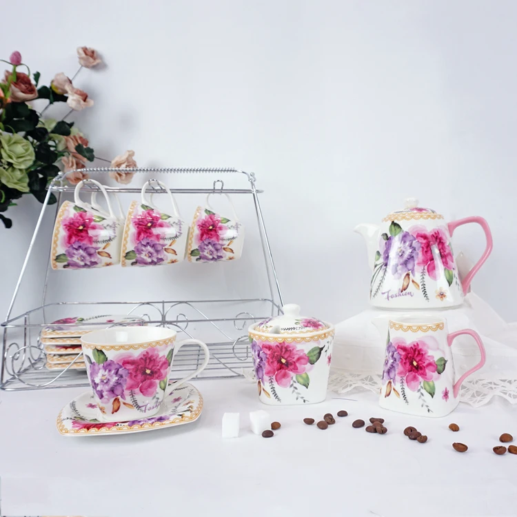 

Stock Products Retail Sale flower design ceramic teapot new bone China tea set porcelain Turkish coffee set with iron stand