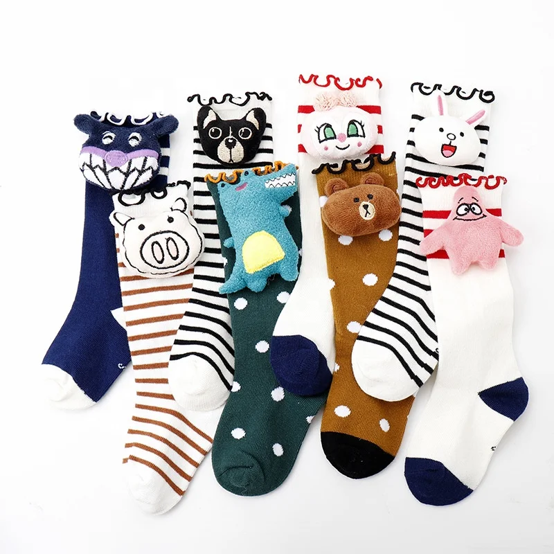 

Hot sale children's creative cartoon doll cotton tube socks kids funky socks, Pantone color