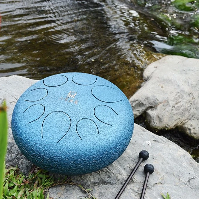 

Steel tongue drum Yoga music Chinese Hank drum Music therapy, Colorful